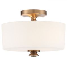 a light fixture with a white shade on it