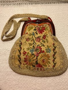 Vintage Tapestry Miriam LefCourt Elgantly Yours, Handbag, Hand Crafted in Italy Tapestry in beautiful condition, inside lining needs stitching on both sides, overall lining in good vintage condition for its age. Some light stains. Some minor scuffs on brown frame, otherwise also in beautiful vintage condition. Handbag could use a good gentle cleaning. Vintage Tapestry Pouch Bag, Vintage Beige Tapestry Bag, Vintage Tapestry Tote Bag, Vintage Tapestry Multicolor Shoulder Bag, Vintage Brown Tapestry Satchel, Vintage Woven Shoulder Bag, Vintage Embroidered Travel Satchel, Vintage Beige Embroidered Shoulder Bag, Vintage Tapestry Handmade Bags