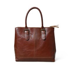 Introducing the City Chic Brown Leather Shoulder Tote—a versatile office bag designed for elegance and practicality. With a central compartment, inside pocket, and sturdy handles adorned with stylish buckles, it seamlessly blends class with functionality. Crafted from naturally tanned buffalo leather, this bag effortlessly transitions from office sophistication to casual chic. Perfect for brunch or quick outings with friends, it complements your style while prioritizing environmental responsibil Classic Satchel With Detachable Handle For Everyday, Timeless Brown Shoulder Bag For Everyday, Timeless Brown Everyday Shoulder Bag, Classic Brown Bag With Leather Handles, Classic Brown Bag With Double Handle, Brown Bags With Leather Handles For Workwear, Timeless Brown Satchel Bag, Everyday Brown Shoulder Bag Briefcase, Classic Cognac Tote Weekender Bag