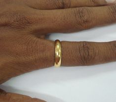 22kt gold ring from rajasthan india. Plain handmade ring made of 22kt yellow gold, good for jewelry collection. Usa ring size - 8 (we can adjust the size) Width of top - 4 mm weight - 6.5 grams Material - 22kt gold. Yellow Gold Temple Jewelry Rings For Formal Events, Formal Yellow Gold Temple Jewelry Rings, Hallmarked Round Band Gold Couple Rings, 22k Gold Round Rings For Marriage, 22k Gold Certified Wedding Rings, Yellow Gold 22k Temple Jewelry Rings, 22k Yellow Gold Temple Jewelry Rings, Gold Couple Rings For Marriage With Round Band, Gold Temple Jewelry Rings For Anniversary