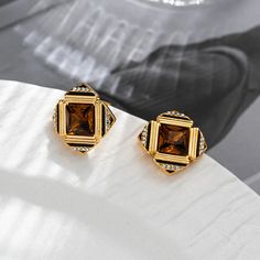 Square Glass Vintage Earrings Step back in time with our Square Glass Vintage Earrings, a stunning blend of classic design and modern elegance. These earrings are the perfect accessory for anyone looking to add a touch of sophistication to their wardrobe. Key Features: Unique Design: The square shape offers a contemporary twist on traditional vintage styles, making them a must-have for fashion-forward individuals. High-Quality Glass: Crafted from premium glass, each earring is designed for durab Elegant Brown Jewelry, Classic Brown Jewelry With Matching Earrings, Elegant Brown Jewelry For Formal Occasions, Elegant Brown Evening Jewelry, Elegant Brown Crystal Earrings Gift, Modern Brown Earrings For Formal Occasions, Elegant Brown Earrings For Anniversary, Vintage Jewelry Necklace, Amber Earrings