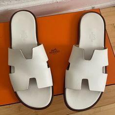 Excellent Condition Izmir Sandal. Used Very Few Times. Size 43 Eu Comes With Box, Dustbags And Receipt. Elegant White Color With White Sole. Perfect For Saint Tropez Beach Outfits Or A Stroll Around The Town. Not An Easy Color Combination To Find. Hermes Izmir Sandal, Hermes Izmir, Saint Tropez Beach, Hermes Shoes, Beach Outfits, Saint Tropez, Color Combination, Flip Flop Sandals, Beach Outfit