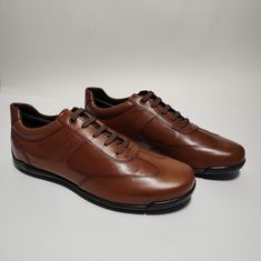 Brand New Shoes With Box Any Questions Comment Below Luxury Brown Moc Toe Oxfords, Brown Wingtip Sneakers For Business, Masculine Brown Moc Toe Dress Shoes, Classic Brown Business Sneakers, Luxury Brown Leather Shoes With Goodyear Welt Construction, Masculine Brown Leather Shoes With Stitched Sole, Classic Brown Wingtip Sneakers, Classic Brown Low-top Dress Shoes, Business Casual Brown Sneakers With Leather Sole