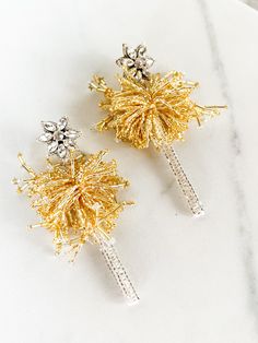 The handmade Stardust Sparkler Earrings will add luxurious shine to any occasion. Capturing the magic of sparklers and fireworks, these earrings perfectly reflect the sparkle of silver and gold from all angles. Ideal for a 4th of July celebration, or any special holiday, these earrings are the perfect accessory! -ultra lightweight-handmade-14k gold plated-3.00" from top to bottom 4th Of July Celebration, Bee Gifts, Summer Earring, Gift Card Sale, Fine Jewellery Necklace, Holiday Specials, July 4th, Stardust, Fourth Of July