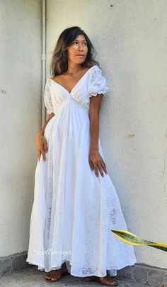 Handmade bohemian v neck maxi dress with floor length full circle skirt. There is the lace between a skirt with lining inside. Puffy lace sleeves. Elastic waist. 100% soft Cotton. There is 2 colors White and Off White. NOTE: Dress TK off white with white lace. waist 21 up to 45 inches. Dress SP off white with cream lace. waist 22 up to 46 inches. Dress E1 off white with white lace. White color lace FV with white lace. PLEASE LEAVE YOUR PHONE NO. AND EMAIL ADDRESS. Measurements: Bust up to 46 in Bohemian V-neck Maxi Dress For Beach Wedding, Bohemian Empire Waist Maxi Dress For Beach, Flowy Empire Waist Maternity Dress For Wedding, Maternity Lace Trim Maxi Dress, White Summer Maternity Dress For Wedding, White Maternity Dress For Summer Wedding, White Summer Maternity Wedding Dress, White Maternity Wedding Dress For Summer, Bohemian V-neck Maxi Dress For Maternity