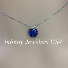 "This necklace is a web cut lab created blue sapphire, 18\"cable chain, 14k white gold #6390 September Birthstone -Approximate total carat weight: 3.30ctw diamond equivalent -Center Stone Size: 9x9mm approx. 3.30ct diamond equivalent -Center Stone Shape: web cut / octagon -Gem Type: lab created blue sapphire -Stone Clarity: VS2 -Stone Color: blue -Moh's Scale: 9 hardness -Metal Type and Purity: 14k white gold -Setting: 4 prong basket -Chain: 18\" delicate 14k gold chain / heavier option with lob Round Diamond Cut Lab-created Sapphire Necklace, Round Lab-created Sapphire Necklace With Diamond Cut, Round Diamond Cut Necklace With Lab-created Sapphire, Diamond Cut Lab-created Sapphire Necklace, Sapphire Necklace With Prong Setting, Lab-created Sapphire Diamond Cut Necklace, Sapphire Jewelry With Brilliant Cut Round Stone, Sterling Silver Sapphire Jewelry Brilliant Cut, Sapphire Jewelry With Vvs Clarity In Round Shape