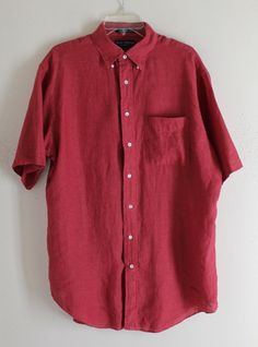 A fine men's shirt from Daniel Cremieux, size medium (may work for a LARGE too as these shirts seem to run big). This shirt is beautiful dusty rose-red...likely garment washed, intended to be casual and beach/seaside ready. Classic collar, one front pocket, short sleeves. Medium-light weight linen, beautiful color and material.  100% Linen, Made in Hong Kong, Designed in France  Fine Italian fabric 49 inch chest, 34 inch length (top of shirt to bottom hem), 48 inches around bottom hem, 19.5 inch Red Linen Shirt With Relaxed Fit, Red Linen Shirt Relaxed Fit, Red Linen Relaxed Fit Shirt, Red Relaxed Fit Linen Shirt, Classic Red Tops With Pockets, Red Linen Short Sleeve Top, Red Relaxed Fit Linen Top, Red Linen Relaxed Fit Top, Red Linen Tops With Relaxed Fit