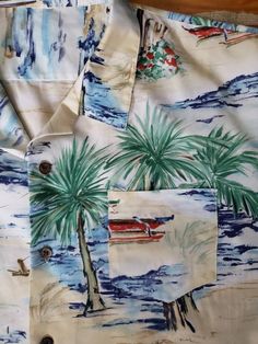 "Step into your Island style with this silky soft probably rayon blend short sleeve coconut button down pocket shirt. Sport some Palms, sail boats and outrigger canoes in this Hawaiian vibe shirt. Good used condition. Some light snags towards the bottom front at pictured. No tags on this item.  My size estimate is XXXL but might fit a bit short for a large person. Please note measurements.  Chest 32\" Sleeve 10\" Length 29\"" Outrigger Canoe, Aloha Print, Sail Boats, Canoes, Island Style, Pocket Shirt, Short Sleeve Shirt, Boats, Sleeve Shirt