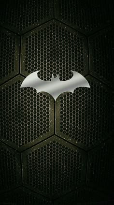 the dark knight rises logo is shown on a black and white background with hexagons