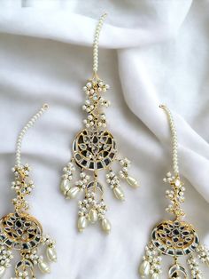 Mirror work and gold plated, this set is perfect for bridesmaid or mehendi/Sangeet to wear with any outfit! Chandbali Jewelry With Zari Work For Party, Elegant Wedding Bridal Earrings With Zari Work, Elegant Wedding Danglers With Gota Work, Eid Bridal Chandbali Earrings With Mirror Work, Eid Chandbali Bridal Earrings With Mirror Work, Festive Bollywood Kundan Necklace With Matching Earrings, Elegant Mirror Work Jhumkas For Diwali, Elegant Diwali Jhumkas With Mirror Work, Elegant Jhumkas With Mirror Work For Diwali