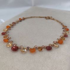 This gorgeous beaded necklace with a modern twist is composed of yellow and golden citrine, fiery African sunstone, orange carnelian and natural zircon. The focal gemstone is a gorgeous fiery African sunstone measuring approximately 12 mm wide.  This necklace is finished in gold vermeil and completed with a pretty toggle clasp. Necklace measures approximately 18-inches. Handmade by me in San Francisco, CA, USA. Matching earrings are listed separately: https://www.etsy.com/listing/527920273/semip Orange Round Faceted Beads Jewelry, Orange Gemstone Beads Round Jewelry, Orange Round Gemstone Beads Jewelry, Orange Round Gemstone Bead Jewelry, Orange Citrine Gemstone Necklace, Orange Carnelian Gemstone Necklace, Elegant Orange Necklaces With Natural Stones, Orange Gemstone Beads And Cabochons For Gifts, Orange Gemstone Beads And Cabochons As Gifts