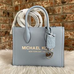 New With Tag 100% Authentic Blue Michael Kors Tote Shoulder Bag, Medium Blue Shopping Bag, Modern Blue Michael Kors Bags, Light Blue Leather Bag With Branded Hardware, Michael Kors Blue Bag For Shopping, Blue Michael Kors Shopping Bag, Blue Michael Kors Bag For Shopping, Michael Kors Blue Bag With Branded Hardware, Blue Michael Kors Bag With Branded Hardware