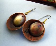 "Dangle Copper Earrings - Hammered Copper color Patina on Light weight Concave and Convex circles come together with a great patina. Gift for Mom or Sister, Fun and Casual and great with Jeans and t-shirt. Larger discs are 1\" across and hang from a surgical steel or Sterling silver ear wire. Oxidized to get the patina and light as a feather. I Can put sterling wires on these. 1 1/2\" long Casual fun earrings for him or her. Thanks" Nickel-free Bronze Artsy Earrings, Soldered Copper Earrings As A Gift, Artsy Copper Drop Earrings, Bronze Electroformed Drop Earrings, Bronze Artsy Earrings For Gifts, Artsy Bronze Earrings For Gift, Artsy Brass Drop Earrings, Artsy Pierced Copper Earrings, Artsy Copper Earrings For Pierced Ears