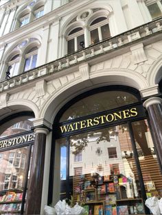 the store front of waterstones has many windows