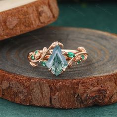 Natural inspired Kite cut Moss Agate Engagement ring Rose Gold Marquise Emerald marriage ring Twist Leaf ring Anniversary promise twist ring ✡Ring details ✧Engagement ring - Center stone: Kite cut Moss Agate - Size: 7*10 mm - Side stone: Lab Emerald - Carat: Total about 0.1ct ✧Band Thickness: 1.2mm ✧Band Width: 1.6mm ღ Custom & Personalization: Almost all Jewelry is available. If you have any ideas, please feel free to contact us for customization. ღ Ring size: All Ring sizes are available. If y Moss Agate Engagement Ring, Marriage Ring, Detailed Engagement Ring, Agate Engagement Ring, Engagement Ring Rose Gold, Twist Ring, Leaf Ring, Ring Rose Gold, Rose Gold Engagement Ring