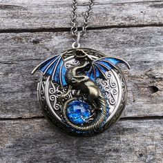 Dragon Necklace Locket with blue opal replica, Fantasy jewelry, Unique Handmade Jewelry Fantasy Locket, Dragon Locket, Style Manifestation, Notes Pictures, Bronze Dragon, Small Notes, Necklace Locket, Birthday Inspo, Red Violet