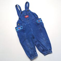 Condition: Good Used Condition; Normal Wash And Wear To The Denim Vintage Oshkosh Bgosh Blue Denim Overalls With The Cutest Airplane Trimmed Pocket. Size 18m Flat Measurements: Shoulder To Saddle: 17" Shoulder To Hem: 25.5" 9.5 Oz (I) Cute Denim Bottoms For Playwear, Denim Blue Cotton Jeans For Playtime, Denim Blue Cotton Jeans, Spring Playtime Denim Blue Jeans, Cute Jeans With Pockets For Playtime, Cute Blue Jeans For Playtime, Spring Playtime Blue Jeans, Blue Denim Bottoms For Playwear, Cute Denim Jeans For Playtime