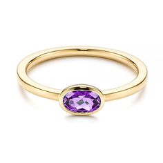 106631 14k Yellow Gold Ring   Amethyst - .50 ctw. This dainty fashion ring is the perfect match with any casual outfit. It is designed to be either worn alone, stacked across the hand with similar designs or layered on one finger. Many versions of this ring are available, from white gold and rose gold, to an assortment of aquamarine, London blue topaz and various colorful gemstones. You can start designing your own ring based on your preferences. Design Your Own Ring         Oval Amethyst in Bez Stackable Ruby Ring For Formal Occasions, 14k Gold Amethyst Solitaire Ring, Modern Amethyst Anniversary Ring, Elegant Stackable Amethyst Ring, Stackable Amethyst Promise Ring, Elegant Oval Amethyst Stackable Ring, 14k Gold Solitaire Sapphire Ring, Dainty Ruby Ring With Bezel Setting, Amethyst Stackable Rings For Anniversary