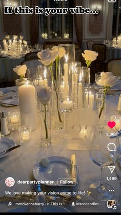 the table is set with candles and flowers