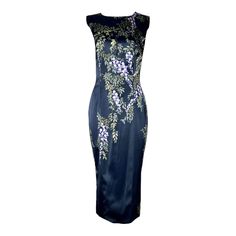 Unique Dolce & Gabbana Evening Dress Beautifully hand-painted silk print with floral design Zipper in the back The dress is a special piece and one of a kind, you will hardly find someone in exactly the same dress Made in Italy Dry Clean Only Size 40