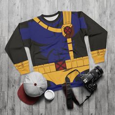 Cyclops Long Sleeve Shirt, Mutant Human Costume, Scott Summers Cosplay, Comic-Con Outfit, Halloween Event Apparel, Fashion for runDisney  This matching item click link below  Unisex Shirt  https://dreamwardrobeshop.etsy.com/listing/1734293161/cyclops-unisex-shirt-mutants-human Leggings  https://dreamwardrobeshop.etsy.com/listing/1726380362/cyclops-leggings-mutant-human Item Details Unisex, is the perfect match for both men and women. A pullover has a crew neck, long sleeves, and a classic fit style. With quality all-over printing capabilities, you won't be worried about white lines in the seams. This fleece is custom cut & sewn and features a crew neck and a set-in sleeve to keep you warm. .: Classic fit .: Polyester, extremely strong and durable synthetic fabric .: Retains its shape and d Superhero Long Sleeve Costume For Cosplay, Superhero Cosplay Costume With Long Sleeves, Long Sleeve Tops With Character Print For Cosplay, Fandom Tops With Character Print For Cosplay, Pop Culture Top For Halloween Cosplay, Themed Crew Neck Top For Cosplay, Fandom Character Print Tops For Cosplay, Fandom Cartoon Print Tops For Cosplay, Fandom Cartoon Print Cosplay Tops