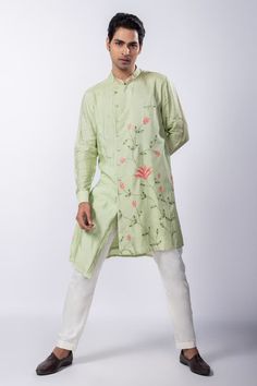 Light green silk mulmul kurta with floral, thread and sequins hand embroidery. Comes with ivory cotton pant pyjama - Aza Fashions Anarkali Style Cotton Sherwani With Floral Embroidery, Cotton Silk Straight Kurta Set For Spring, Spring Cotton Salwar Kameez In Pista Green, Spring Sherwani With Gota Work, Spring Wedding Sherwani With Gota Work, Chanderi Kurta With Cutdana For Spring, Green Chanderi Sherwani With Cutdana Details, Green Chanderi Sherwani With Cutdana, Anarkali Cotton Silk Kurta For Spring