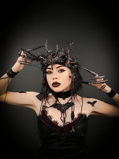 Majestic gothic tiara in black with red rhinestones, decorated with branches and covered with liquid plastic. Perfectly complement the image of Queen of Vampires, Queen of Bats, Dark Fairy, Gothic Queen. The size of this headgear is universal for an adult. It sits softly and comfortably on the head, you can dance and move for a long time. 100% designed and handmade by our designers ( SETA Design studio in Kyiv).  It will be securely packed in a box. Feel free to contact us if you have any questi Adjustable Gothic Costume Accessories For Fantasy Events, Gothic Costume Hats And Headpieces For Cosplay, Gothic Headpiece For Costume Party, Gothic High Crown Costume Accessories For Costume Party, Mystical Crown Headpiece For Masquerade, Gothic Crown Costume Accessories For Cosplay, Mystical Halloween Cosplay Headpieces, Halloween Crown Costume Hat For Fantasy Events, Gothic Crown For Masquerade