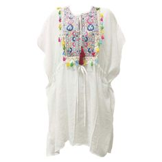 The Beautiful Boho Style Floats Weightlessly Over Sun Kissed Skin. Ideal Over Swimsuits When On Vacation, By Poolside And Stroll Along The Beach. Perfect As A Top Over Camisoles And Tank Tops With Jeans, Shorts And Flowing Skirts. Makes A Delightful Summer Dress Too! Exquisitely Embroidered Front With Blue And Pink Floral Designs Multi Color Tassels, Drawstring Waist And Elastic Back For A Stylish Silhouette. 50% Viscose, 50% Polyester 20" X 32" Embroidery Tassel Cord, Colorful Tassels Hand Wash White Beach Top With Back Tassel Tie-up, Summer Embroidered White Kaftan, Embroidered White Tops For Beach Season, Embroidered White Summer Kaftan, Summer White Embroidered Kaftan, White Summer Top With Tassel Ties, White Summer Tops With Tassel Ties, White Tassel Tops For Beach, White Tassel Tops For The Beach