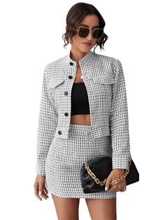 Make a lasting impression in this fashionable plaid tweed blazer jacket & skirt set. Made out of premium fabrics, the tweed blazer jacket features a timeless plaid pattern for an elegant look. The skirt features an alluring skirt silhouette for an added touch of sophistication. Perfect for office or dress-up occasions, this plaid tweed set will have you looking fashionable and feeling confident. Soft Fabric Button closure Machine Wash Fabric has non stretch Formal Houndstooth Tweed Dress For Fall, Elegant Houndstooth Tweed Jacket For Office, Elegant Tweed Skirt Suit For Office, Long Sleeve Tweed Skirt Suit For Formal Occasions, Formal Long Sleeve Tweed Skirt Suit, Chic Houndstooth Tweed Jacket For Formal Events, Chic Houndstooth Tweed Jacket For Formal Occasions, Classic Tweed Skirt Suit For Office, Chic Tweed Skirt Suit For Formal Occasions