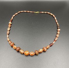 Rare Etched Carnelian Beads Mala Necklace Every Beads is Beautifully Etched With Rare Pattern We Provide Fast and Free Shipping Service Enjoy Brown Amulet Beads For Jewelry Making, Brown Amulet Necklaces With Large Beads, Brown Amulet Necklace With Round Beads, Brown Large Oval Beads, Gems, And Cabochons, Brown Carnelian Large Beads Gems And Cabochons, Brown Beaded Gemstone Amulet Necklace, Brown Carnelian Beaded Necklace With Large Beads, Brown Carnelian Large Beaded Necklace, Traditional Brown Carnelian Beaded Necklaces