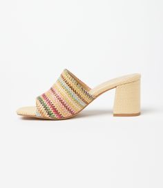 Conquer your day with ease with these raffia slides that strike the perfect balance between a walkable heel height and on-trend style. This design features padded OrthoLite Hybrid insoles and a patented down curve, ensuring a natural and comfortable stride with arch support. The raffia material adds a hint of texture and a bohemian charm, making these sandals a versatile addition to your wardrobe. Raffia upper Heel height: 2 3/4 inches Imported True to size Seychelles | Karen Kane Adapt Raffia H Spring Slip-on Heels With Woven Sole, Synthetic Block Heel Slides For Beach, Summer Slip-on Mules With Padded Heel, Multicolor Slip-on Mules For Spring, Trendy Multicolor Mules For Spring, Summer High Heel Slides With Padded Heel, Spring Synthetic Mules With Cushioned Footbed, Spring Beach Mules With Open Heel, Beach Slides With Padded Open Heel