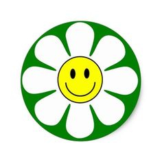 a green and white flower with a smiley face on it's center, in the shape of a circle