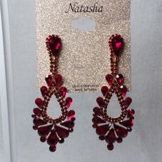 Dangle Pierce Earrings With Red Teardrop Rhinestones By Natasha. New Without Tags. Did Not Removed From Card For Pictures. Measurements 3 Inches Long By 1 Inch At Widest Point. Measurements Are Done Laying Down And Did Not Removed From Card, Are Estimated. # Ad-4 Red Crystal Metal Earrings For Parties, Red Crystal Metal Party Earrings, Red Ruby Dangle Chandelier Earrings, Red Metal Crystal Party Earrings, Red Jeweled Earrings For Festive Occasions, Red Drop Crystal Earrings As Gift, Red Jeweled Metal Earrings, Red Crystal Earrings For Gift, Ruby Dangle Earrings For Party