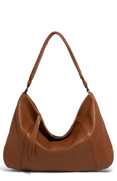 Woven accents give a vintage-inspired look to this slouchy hobo bag designed with a spacious interior and single shoulder straps. 19"W x 11"H x 3.5"D Lined Leather Imported Casual Hobo Bag With Leather Lining For Travel, Casual Travel Hobo Bag With Leather Lining, Casual Hobo Bag For Travel With Leather Lining, Classic Rectangular Hobo Bag For Fall, Classic Fall Hobo Bag Crossbody, Classic Fall Hobo Bag For Daily Use, Classic Crossbody Hobo Bag For Fall, Classic Fall Crossbody Hobo Bag, Hobo Bucket Bag With Adjustable Strap For Errands