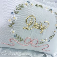 Beautiful embroidered baby pillow, ideal gift for new parents, this pillow is personalized with the baby's name, it is a unique and special gift. If you like add the name of your personalization and I will make it for you. This Product is made 100% by hand, all the embroidery is handmade. Pillow * Cover dimensions approx. 12x11.1/2inch. * Pillow dimensions approx. 12x10 inch. * Made with 100% cotton fabric *This product includes the pillow. * both sides of the pillow (front-back) are made with the same fabric. If you decide to buy this pillow, I will be more than happy, I am an entertaining mom and I do my best to give that special touch to each piece, it takes me approximately 3 days to make and embroider this pillow by hand, so you will be buying a 100% handmade piece. Learn more about o Baby Pillow Cover, Hand Embroidered Pillow, New Parents Gift, Monogram Pillow, Unique Baby Gift, Name Pillow, Hand Embroidered Pillows, Pillow Embroidery, Pillow Dimensions