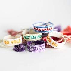 several bracelets that say go volls, such as to be made from fabric