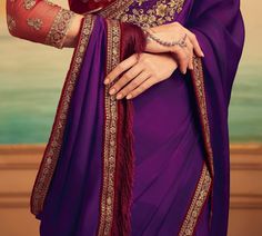 Purple & Maroon Designer Embroidered Silk Party Wear Saree-Saira's Boutique Fitted Party Blouse With Embroidered Border, Fitted Floor-length Sets With Embroidered Border, Festive Saree With Intricate Embroidery And Long Sleeves, Fitted Floor-length Lehenga With Embroidered Border, Embroidered Border Blouse Piece For Wedding, Fitted Georgette Lehenga With Embroidered Border, Floor-length Lehenga With Embroidered Border, Floor-length Dupatta With Embroidered Border, Fitted Floor-length Dupatta With Embroidered Border