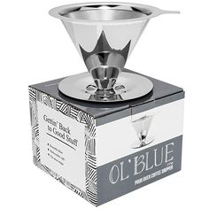 an old blue coffee driper in a box on a white background with the lid open