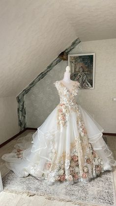 a wedding dress on display in an attic