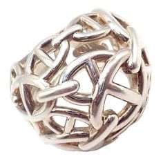 About This Piece: The Authentic! Hermes Sterling Silver Large Chaine D'anchre Dome Ring is a testament to understated luxury and craftsmanship. Boasting a size 4.5, this ring captures Hermes's iconic Chaine D'anchre motif, showcasing interlocked chain links crafted into a statement dome design. Made of gleaming sterling silver, the piece exudes both strength and elegance. Every detail is meticulously fashioned, reflecting Hermes's unparalleled commitment to quality. This ring is not just jew... Hermes Jewelry, Understated Luxury, Dome Ring, Chain Links, Domed Ring, Buying Jewelry, Womens Jewelry Rings, Rings Statement, Chain Link