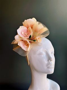 elegant magnolia or orchid flower fascinator headpiece, perfect for tea parties, derby events, and other special occasions!  Thank you for supporting small businesses and we hope our products bring you and your loved ones Joy & Happiness! S H I P P I N G  -   Last minute masquerade mask shopping? 24 hr processing available. Pick appropriate shipping method and leave us checkout note! 1-2 day guaranteed delivery services also offered, add items to cart and click on shipping tab for rates.  Pls leave a check out note with your need date & contact number (especially for expedited and custom orders) Msg for delivery time frames (Include your state/country). S I Z E Adult size. Detailed dimensions are available upon request. C O N T A C T Text: 1-516-654-4643 Email: Lanai.ink6 [!at] gmail.com W Chic Kentucky Derby Headband Fascinator, Spring Formal Headband Headpiece, Formal Spring Headband, Flower-shaped Party Fascinator With Flower Decoration, Chic Hair Accessories For Wedding And Kentucky Derby, Elegant Mini Hats With Matching Headband For Summer, Elegant Mini Hat With Matching Headband For Summer, Chic Hair Accessories For Wedding At Kentucky Derby, Elegant Fascinator With Matching Headband For Races