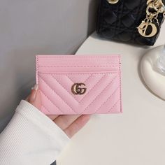 Introducing the epitome of sophistication and style: the Classic GG Wallet Card Holder - Luxury Edition. Crafted with meticulous attention to detail and unparalleled craftsmanship, this accessory seamlessly merges timeless elegance with modern functionality. Made from the finest quality materials, the Classic GG Wallet exudes luxury at every touch. Its iconic GG monogram pattern embossed on premium leather not only showcases impeccable taste but also speaks volumes about your discerning eye for Luxury Pink Rectangular Coin Purse, Luxury Pink Card Holder With Card Slots, Luxury Pink Card Holder, Elegant Pink Bifold Coin Purse, Elegant Pink Everyday Card Holder, Chic Rectangular Card Holder For Gift, Pink Rectangular Card Holder For Formal Use, Classic Pink Wallet With Card Slots, Classic Pink Wallets With Card Slots