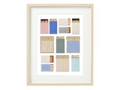 a white frame with many different color swatches on the front and back of it