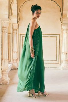 Emerald green one shoulder maxi dress with floral cutwork embroidered panel. - Aza Fashions Summer Wedding Maxi Dress With Asymmetrical Neckline, Floor-length One Shoulder Dress For Summer Wedding, Bohemian Floor-length Dress With Side Slits, Green One-shoulder Dress With Side Slits, One Shoulder Green Dress With Side Slits, Chic Green Maxi Dress With Side Slits, Summer Wedding Dress With Side Slits, Elegant Green Maxi One Shoulder Dress, Floor-length Green Maxi Dress With Side Slits