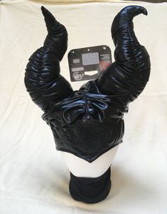 Pull on headdress from Disney's "perfectly evil" witch queen, Maleficent, from "Sleeping Beauty".  Includes attached neck warmer! Stuffed horns have flexible inner wire so you can shape them to fit your preference (see 4th photo). Very lightweight (5 oz), so easy to wear. Photo is actual item you will receive. 100% customer feedback. Stored in, and shipped from, a pet-free, smoke-free home. Thanks for looking - have fun! We appreciate your time, and hope that we can provide just what you want! No returns unless there is an error in the item description. Maleficent Headpiece, Witch Queen, Disney Maleficent, Evil Witch, Customer Feedback, Maleficent, Neck Warmer, Headdress, Headpiece