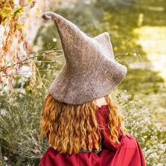 Light Brown Curly Tip Witch Hat with Brim - Wool | Sorceress / Wizard Hats Similar to our other witch hats, but with a curled tip and more texture to the fabric. Vintage woolen felt, curled-tip, wide-brim witch hat. One size fits all. For men or women. Dry clean only. Material: 100% Wool.Color: Light Brown. Worldwide shipping available!Custom made to order: Please allow up to 1-3 weeks before item ships. Share: Witchy Wide Brim Hat For Fall, Witchy Hat With Curved Brim For Winter, Witchy Winter Hat With Curved Brim, Witchy Curved Brim Winter Hat, Witchy Fitted Hat With Curved Brim, Fitted Witchy Hat With Curved Brim, Witchy Winter Costume Hat, Witchy Costume Hats With Curved Brim For Fall, Witchy Brimmed Winter Hats