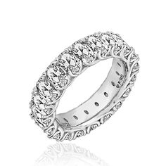 a white gold wedding band with round cut diamonds