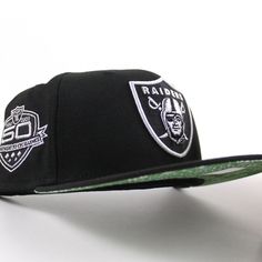 Las Vegas Raiders 50th Anniversary New Era 59Fifty Fitted Hat in Black with Green Paisley Under Brim. B5: 13 Hat Stores, Green Paisley, Las Vegas Raiders, Sports Caps, New Era Cap, New Era 59fifty, Fitted Caps, Fitted Hat, 50th Anniversary