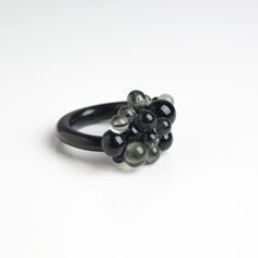 This Black cluster ring is made of glass in the lampwork technique. This magnificent glass ring can be a shining addition to your outfit or simply a unique note, matching your mood and individuality! 💕 You will definitely look stunning with this chunky cocktail ring! Dimentions: Check the drop down menu to see what sizes are available. If the size you need is not available, feel free to contact me and I will make the ring you need. 🎁 This chunky cocktail ring will also be a great gift for birt Black Round Glass Jewelry, Modern Handmade Rings For Party, Unique Black Resin Jewelry, Modern Black Glass Jewelry, Modern Black Rings For Party, Modern Black Party Rings, Modern Resin Ring Jewelry, Black Cocktail Ring, Black Statement Ring