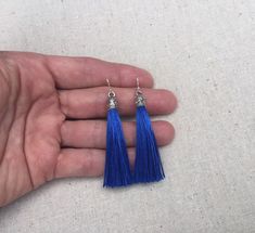 "Chic royal blue tassel earrings! They would add a pop of color to any outfit for any occasion. Dress them up or down. They are timeless and versatile. They are lightweight, fun and unique! The tassels measure 2 1/8\" long by 1/4\" wide. They hang from simple silver ear wire hooks. Overall drop length is about 2 1/4\". Metal is allergy free plated silver. These are my latest creation! I have them available in many colors! Find them all under the category tassel earrings in my shop. Thanks for st Royal Blue Jewelry, Peace Sign Jewelry, Blue Statement Earrings, Royal Blue Earrings, Peace Jewelry, Small Silver Earrings, Peace Earrings, Blue Tassel Earrings, Boho Drop Earrings